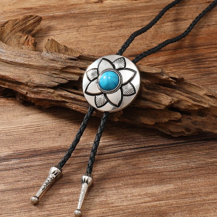 Oval Carved Petal Black Turquoise Stone Bolo Tie