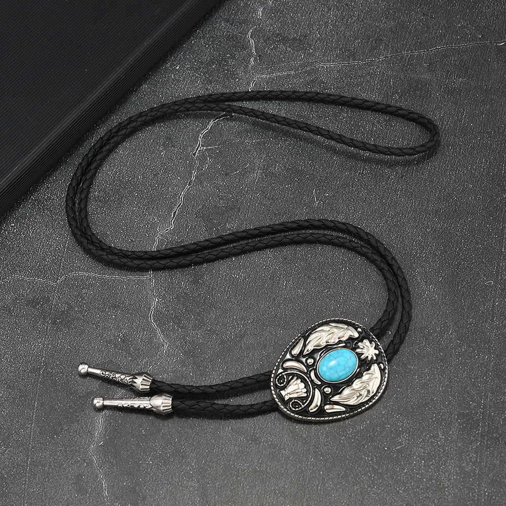 Oval Turquoise Black-and-white Carved Metal Bolo Ties - image 3