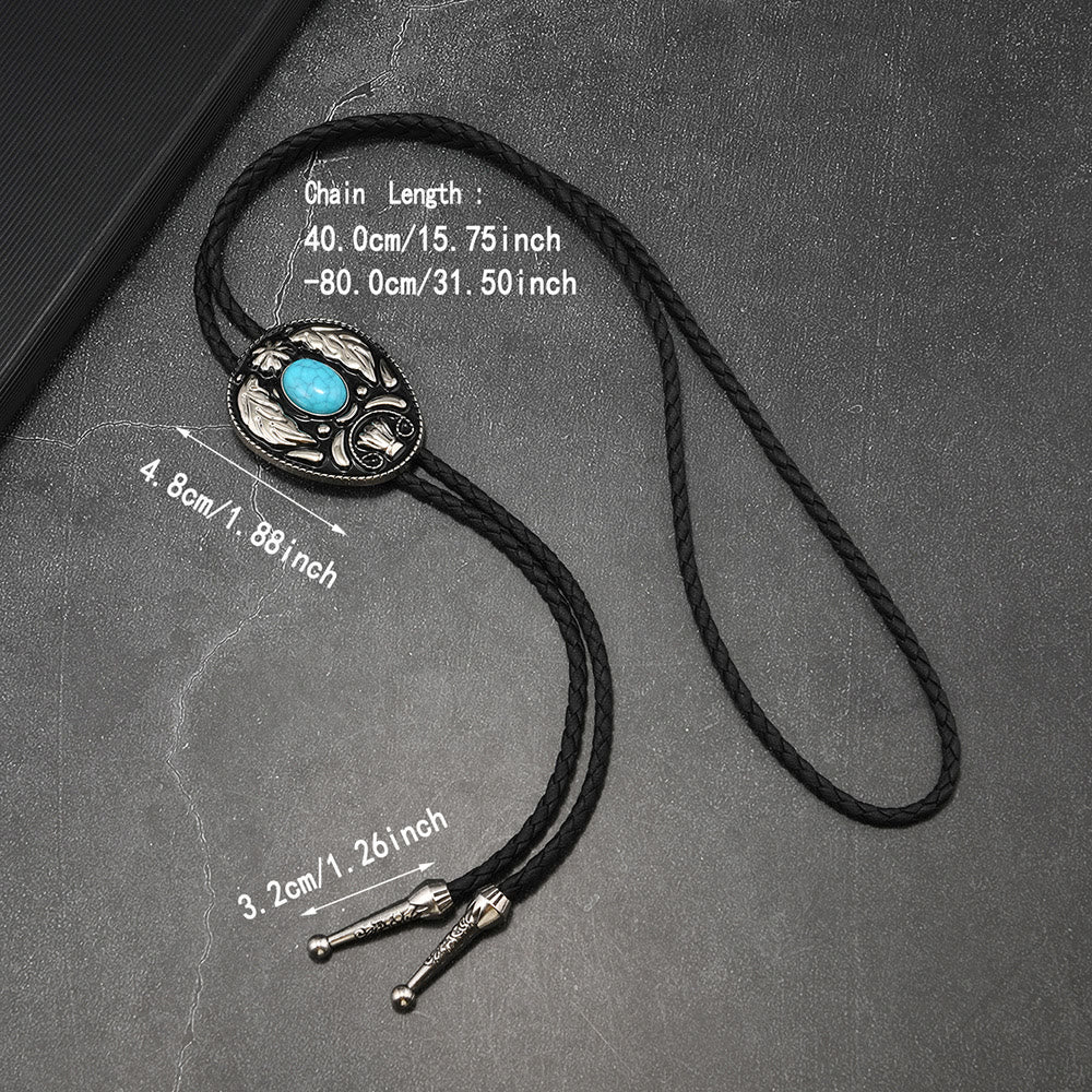 Oval Turquoise Black-and-white Carved Metal Bolo Ties - image 4