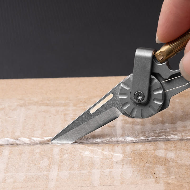 Titanium Alloy Folding Knife Climbing Keychain - image 1