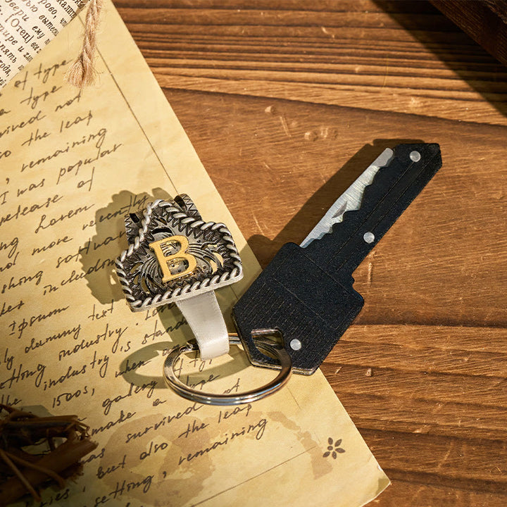 Western Retro Letter Keychain With Key-Shaped Knife - image 1