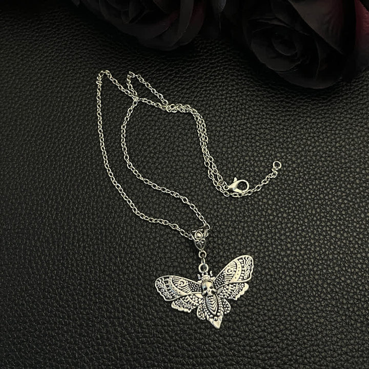 Death Embraces Beauty Gothic Skull Moth Pendant Necklace - image 1